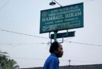 Papan nama Ponpes Mambaul Hikam milik Imam Syafii (52) alias Supar yang berada di Desa Sugihan, Kecamatan Kampak, Kabupaten Trenggalek.
