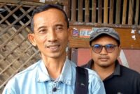 Eko Prayitno, guru SMP Negeri 1 Trenggalek didampingi Ketua DPC GMNI Trenggalek, Muhammad Sodiq Fauzi. 
