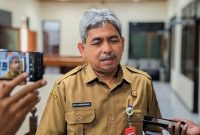 Sekretaris Daerah Trenggalek, Edy Soepriyanto saat dikonfirmasi awak media di Kantor DPRD Trenggalek, Senin (22/12/2025).