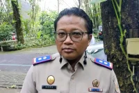 Kepala Kantor Pertanahan (Kakantah) Trenggalek Heru Setiyono saat dikonfirmasi awak media di Hutan Kota, Senin (13/2/2026).