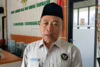 Kepala Kantor Kementerian Haji dan Umrah Trenggalek, Subkan Hamzah saat dikonfirmasi awak media mengenai meninggalnya satu jemaah haji asal Trenggalek pada Selasa (2/6/2026).